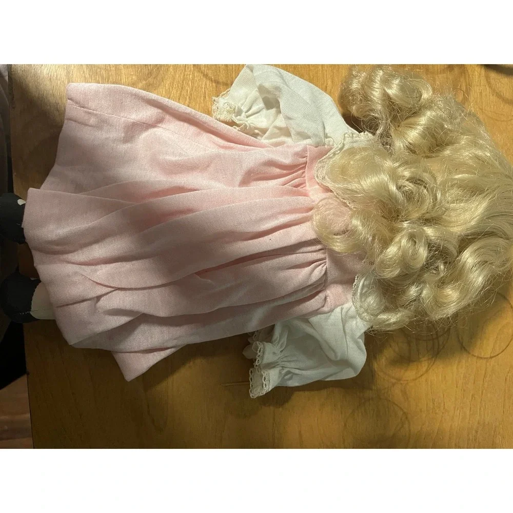 Vintage apple sauce doll with vintage baby dress